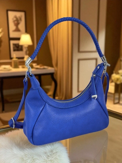 Royalfashion Маленька жіноча сумочка з екошкіри з декоративним ремінцем Lacquea