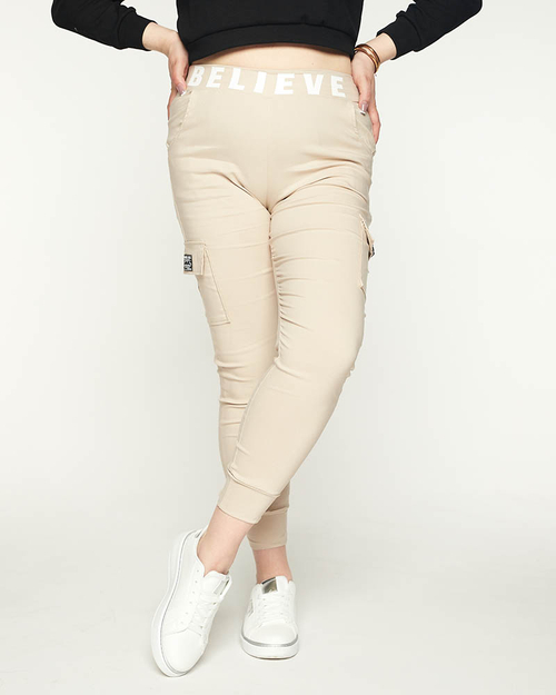Бежеві жіночі штани з кишенями PLUS SIZE