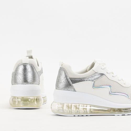 OUTLET Кремове жіноче спортивне взуття на танкетці Runiso - Взуття