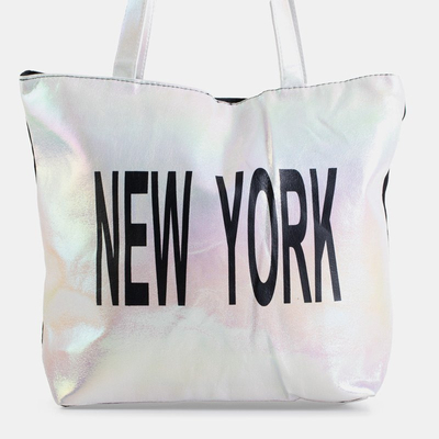 Біла жіноча сумка з написом