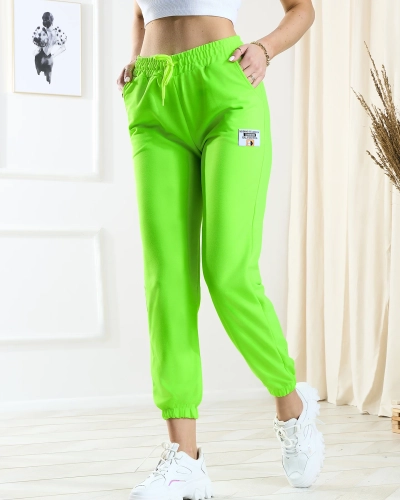 Жіночі неоново-зелені спортивні штани - Одяг