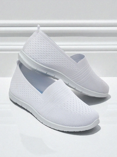 Білі жіночі балетки Ariadne з дихаючої тканини на плоскій підошві