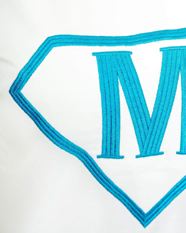 Dámská bílomodrá sportovní tepláková souprava s odznakem - Oblečení