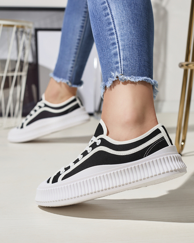 Жіночі кросівки на суцільній підошві чорного кольору Dessica - Взуття