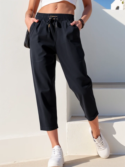 Royalfashion Прості жіночі тканинні штани 7/8