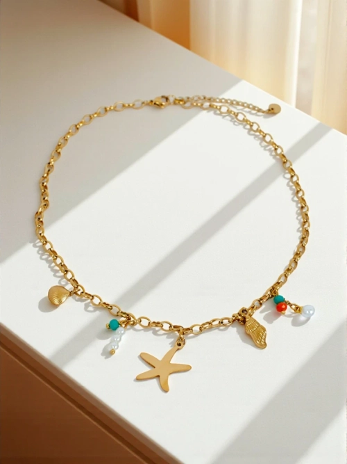 Намисто Atena Charm Sea – золоті амулети з морськими мотивами