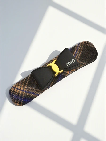 Royalfashion Kostkovaná sponka do vlasů s mašlí