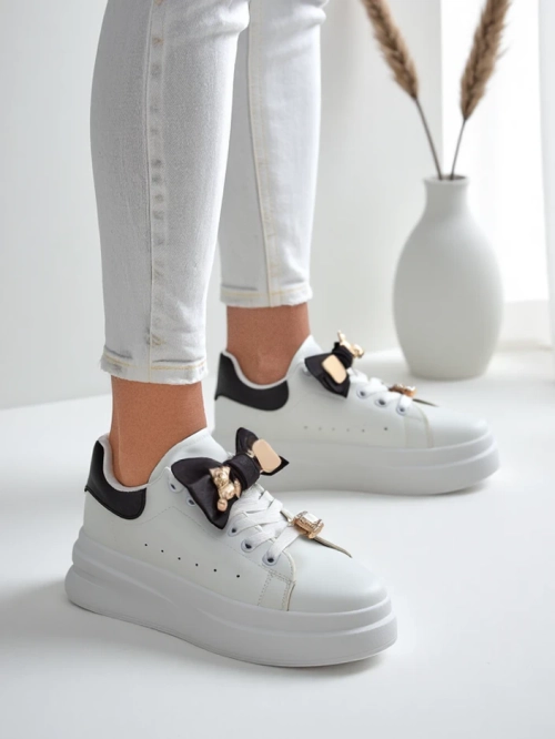 Royalfashion жіночі платформені кросівки з бантом Genimma