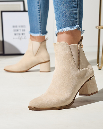 Жіночі ботильйони на низькій шпильці кольору екрю Xizia - Взуття