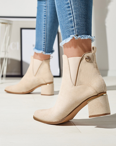 Жіночі ботильйони на низькій шпильці кольору екрю Xizia - Взуття