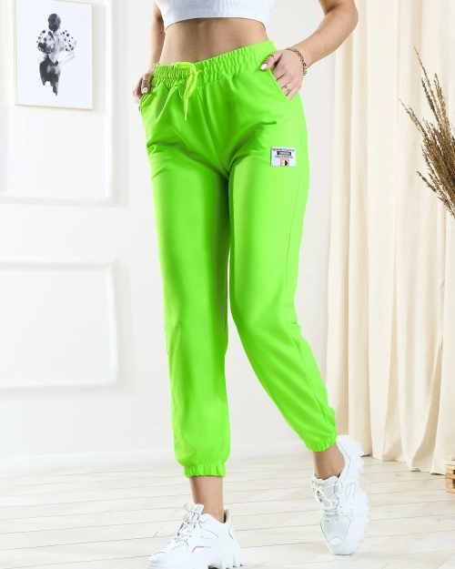 Жіночі неоново-зелені спортивні штани - Одяг