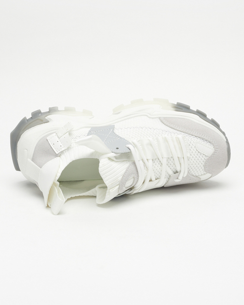 Біле жіноче спортивне взуття на масивній підошві Tiroka - Взуття