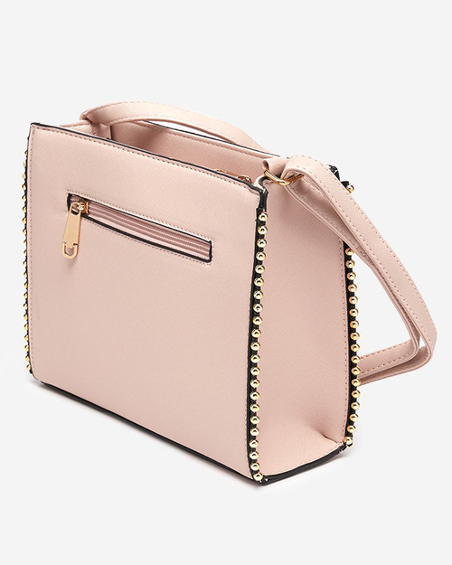 Світло-рожева сумочка з оздобленням