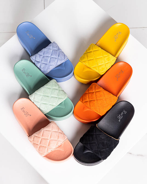 Сині стьобані шльопанці на платформі Koriner