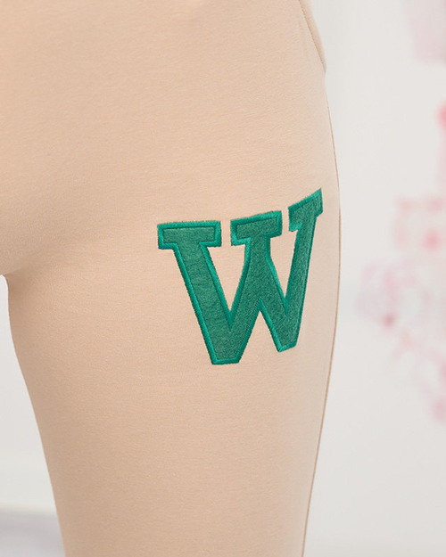 Жіночі бежеві спортивні штани з кольоровою нашивкою - Одяг