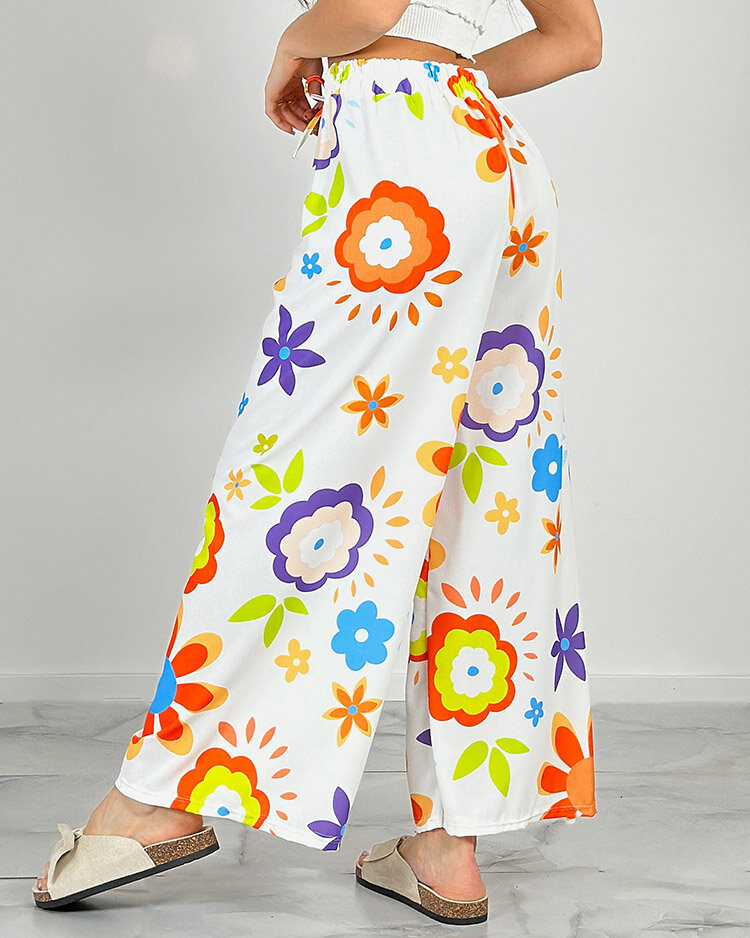 Royalfashion Dámské široké kalhoty z květinové látky