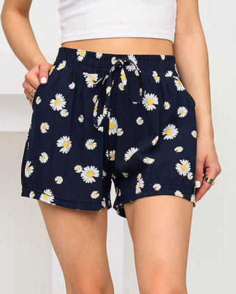 Темно-сині шорти з принтом ромашок