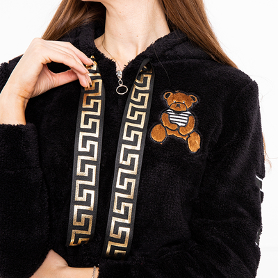 Чорний жіночий светр на блискавці з нашивками