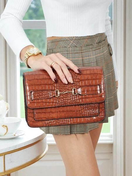 Lakovaná malá dámská kabelka z eko kůže Lunisse