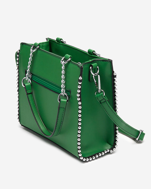 Зелена жіноча сумочка з плетеною вставкою