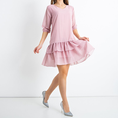 Рожева жіноча сукня з воланами