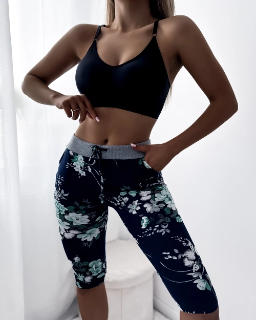 Жіночі шорти 3/4 з малюнком темно-синьо-зеленого кольору. PLUS SIZE - Одяг