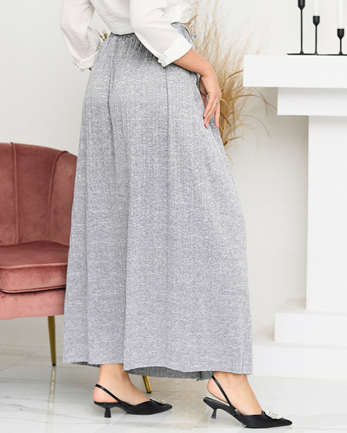 Жіноча плісована спідниця міді зі світло-сірими гудзиками - Взуття