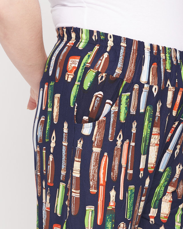 Vzorované tmavě modré dámské kalhoty - Oblečení