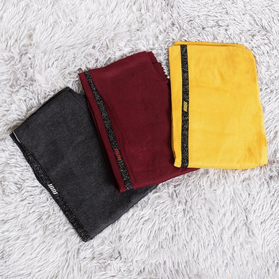 Tmavě šedé dámské legíny s pruhy - Oblečení