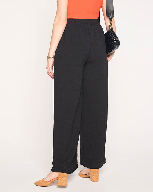 Жіночі широкі штани палаццо чорного кольору - Одяг