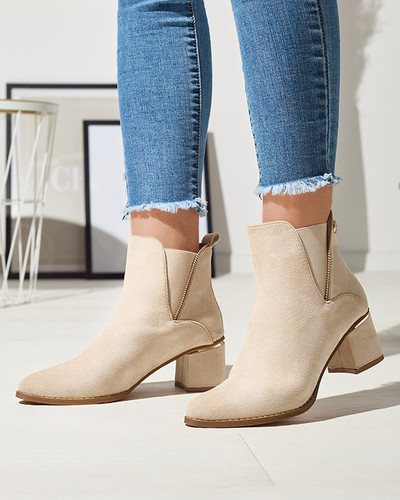 Жіночі ботильйони на низькій шпильці кольору екрю Xizia - Взуття