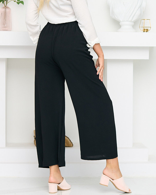 Чорні жіночі широкі штани палаццо. Одяг