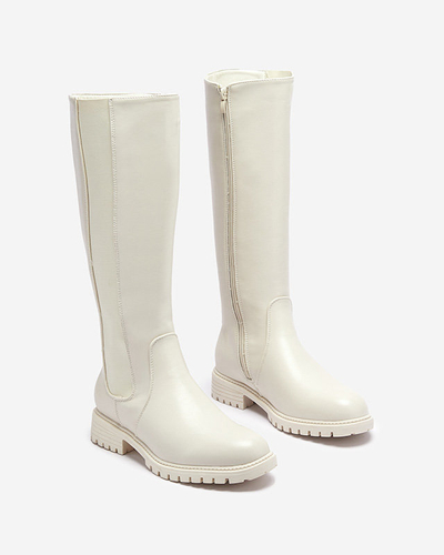 OUTLET Жіночі чоботи до коліна на пласкому каблуці кольору екрю Dexis - Взуття