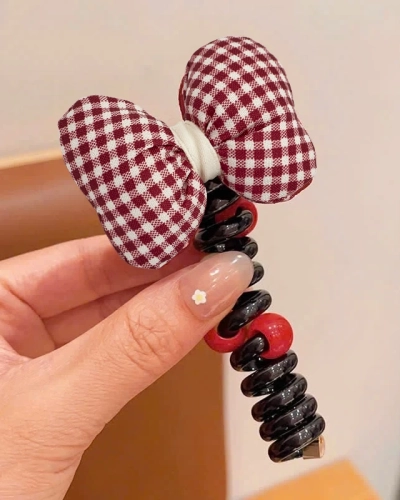 Royalfashion Gumička do vlasů ve tvaru spirály s mašlí