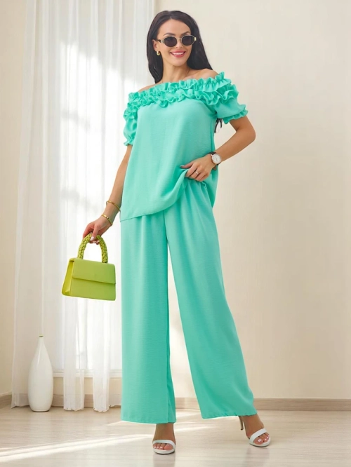 Royalfashion Жіноча комплектація з топом на одно плечо з короткими рукавами та декоративним вирізом, а також розкльошеними штанами