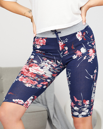 Vzorované 3/4 dámské kraťasy v tmavě modré a růžové barvě. Nadměrná velikost