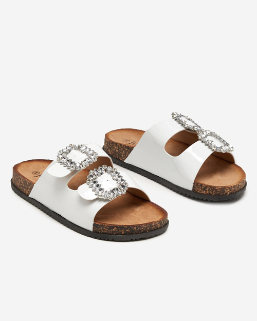 Білі жіночі шльопанці з декорованими застібками Olimika