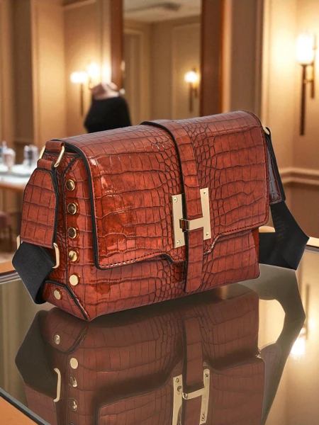 Royalfashion Lakovaná malá dámská kabelka z eko kůže Velia Crest