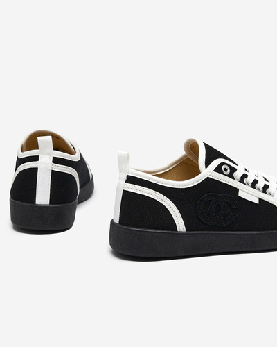 OUTLET Černé dámské tenisky s odznakem Wefera - Obuv