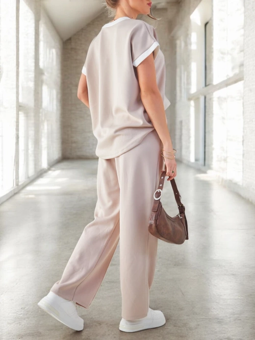 Royalfashion Жіночий в'язаний комплек комплект з короткими рукавами та розкльошеними штанами