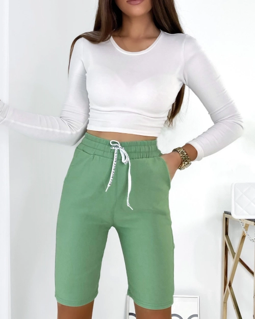 Жіночі тканинні шорти Royalfashion до коліна зеленого кольору