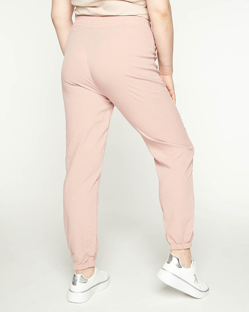 Жіночі джоггери з рожевої тканини PLUS SIZE - Одяг