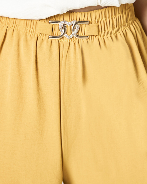 Жіночі широкі штани палаццо гірчичного кольору - Одяг