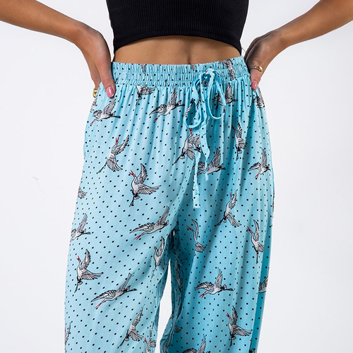 Блакитні жіночі штани з принтом