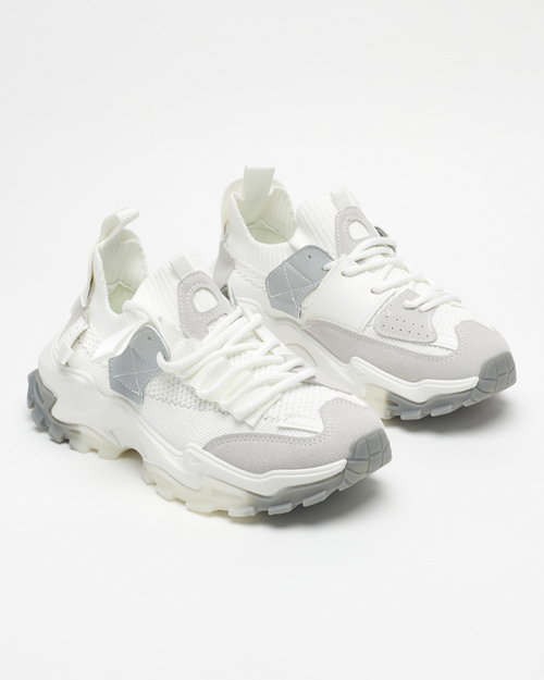 Біле жіноче спортивне взуття на масивній підошві Tiroka - Взуття