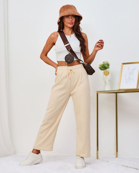 Royalfashion Zateplené krémové manšestrové dámské kalhoty