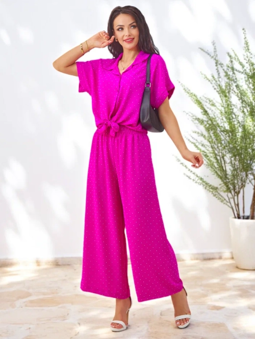 Royalfashion Жіночий комплект з зав'язаною сорочкою з короткими рукавами та розкльошеними штанами з стразами