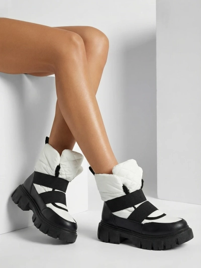 Dámské sněhule na ploché podrážce v černobílé barvě Ferory- Obuv