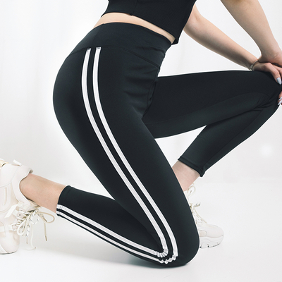 Чорні жіночі штани з лампасами