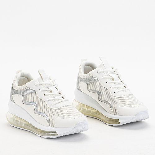 OUTLET Кремове жіноче спортивне взуття на танкетці Runiso - Взуття